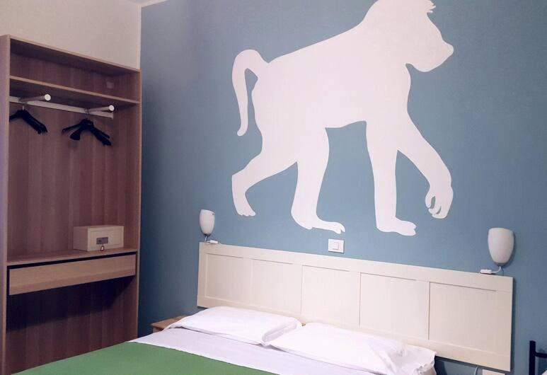 Postel nebo postele na pokoji v ubytování Hotel Aloha