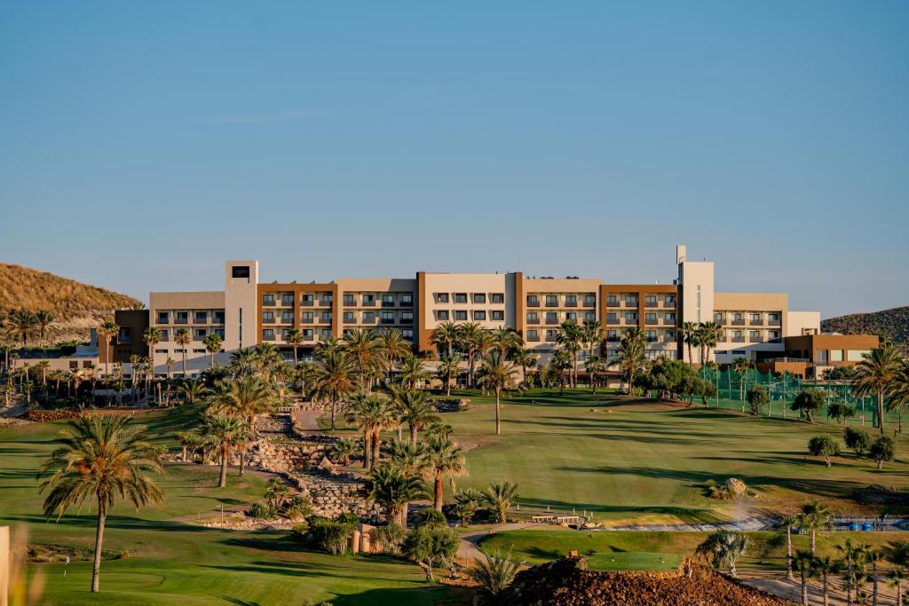 an aerial view of a resort with palm trees at Valle Del Este Golf Resort in Vera