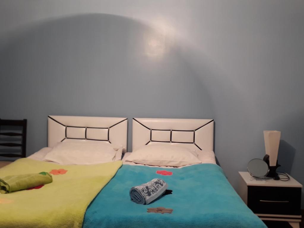 Postel nebo postele na pokoji v ubytování Guest House Karati