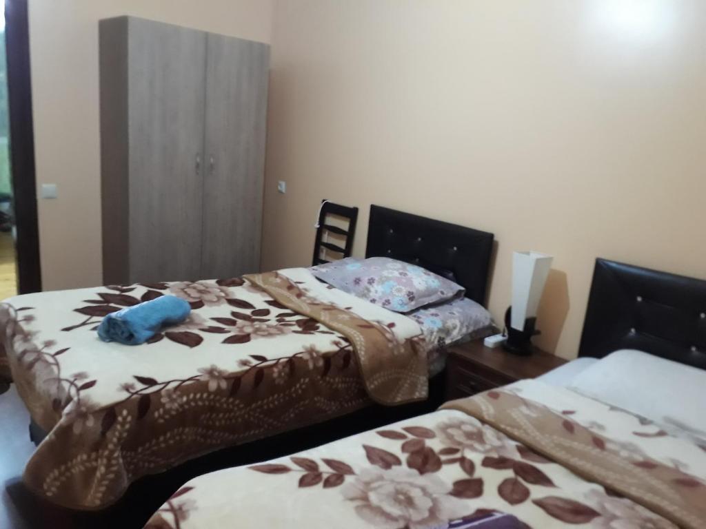 Postel nebo postele na pokoji v ubytování Guest House Karati