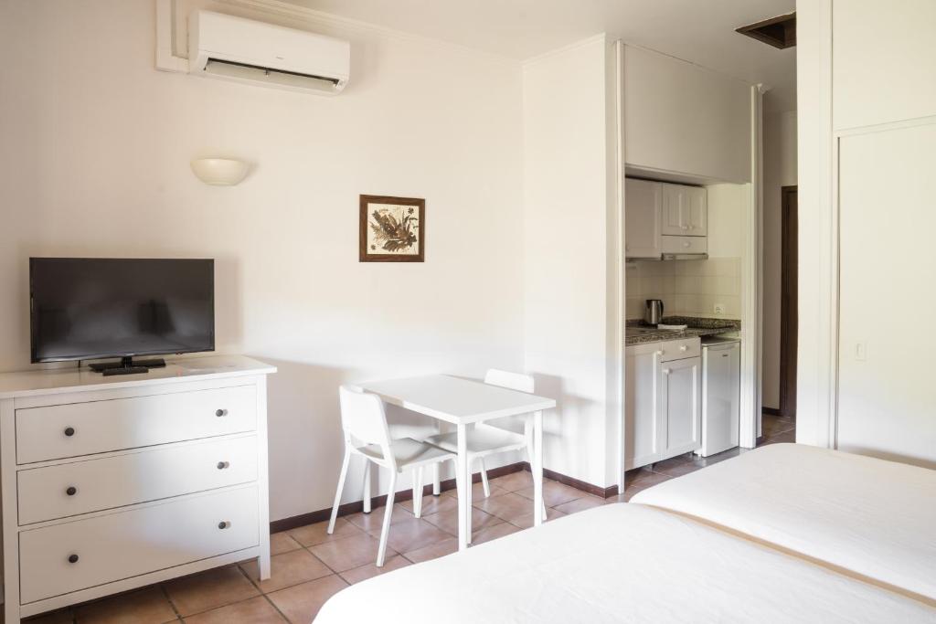 Een TV en/of entertainmentcenter bij Casas de Campo do Pomar B&B - Self Check-in
