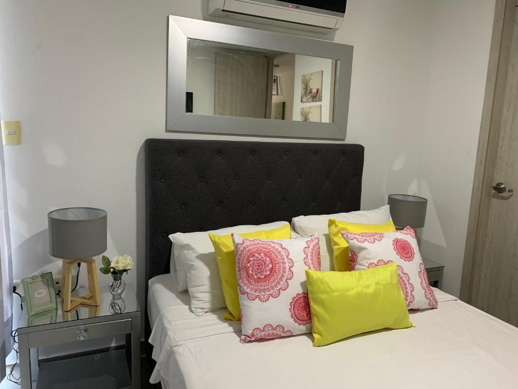 Ένα ή περισσότερα κρεβάτια σε δωμάτιο στο Apartamento Nuevo Norte de Valledupar-1 Habitación, Balcón y Parqueadero