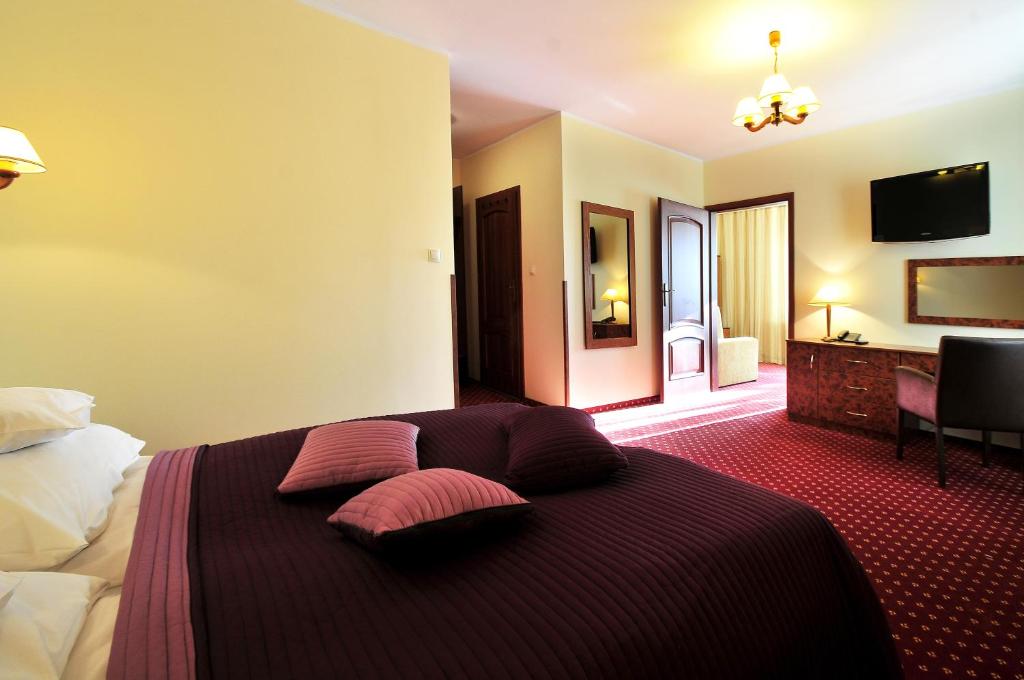 Postel nebo postele na pokoji v ubytování Hotel Continental