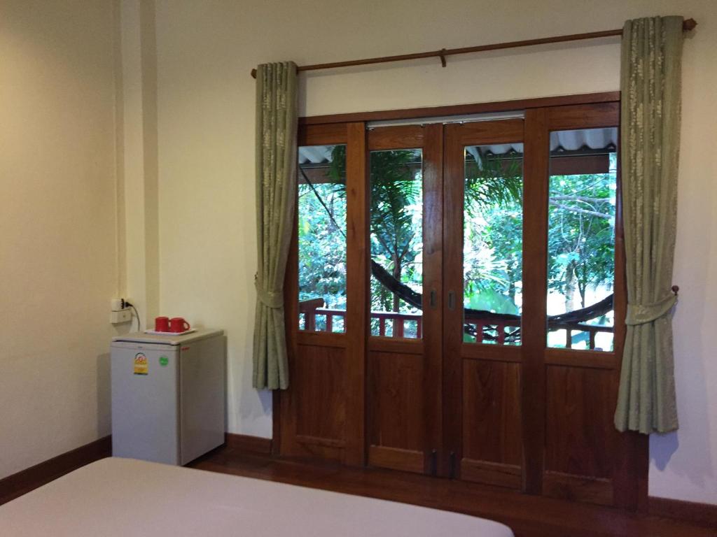 Postel nebo postele na pokoji v ubytování Pai Loess Resort
