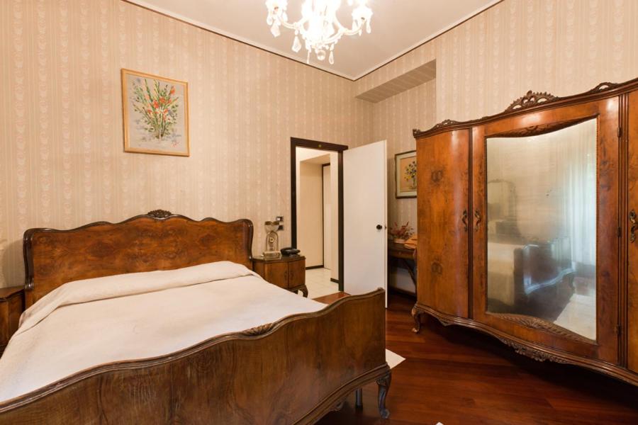 Postel nebo postele na pokoji v ubytování Hotel Letizia