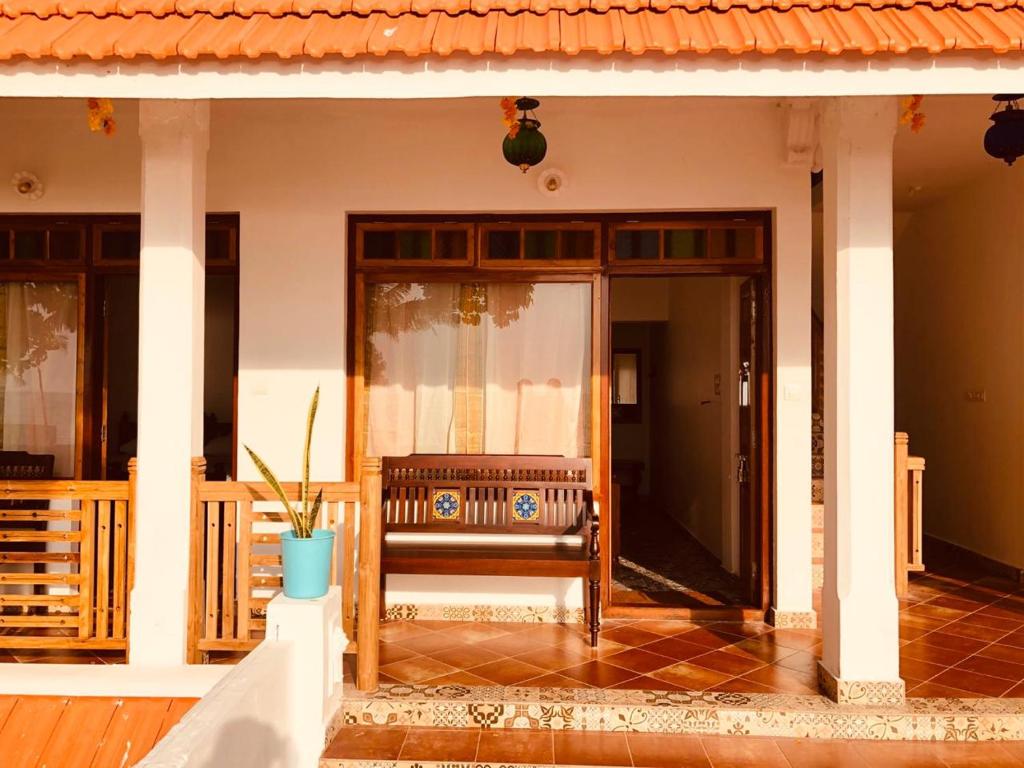 Balkón nebo terasa v ubytování Lemon Dew Beach House, Alleppey Beach