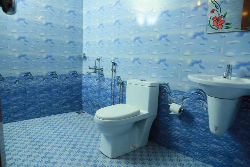 Koupelna v ubytování Marari Nest Beach Homestay