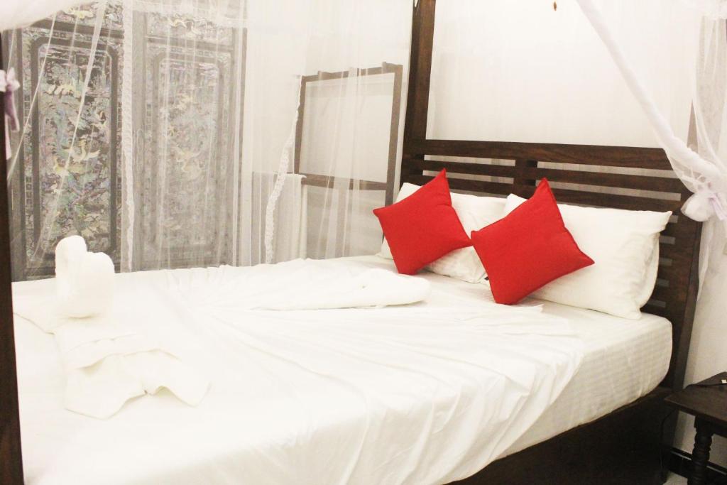 Postel nebo postele na pokoji v ubytování Hotel BEJEWELLED Sigiriya