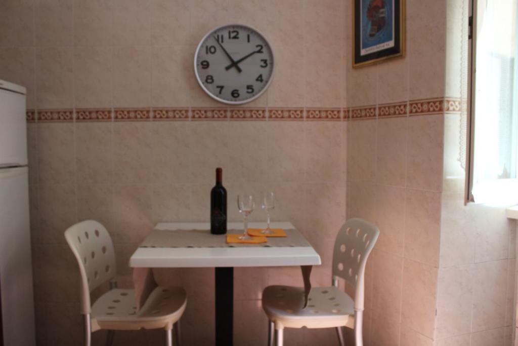 Nápoje v ubytovaní Colosseum New Charming Apartment