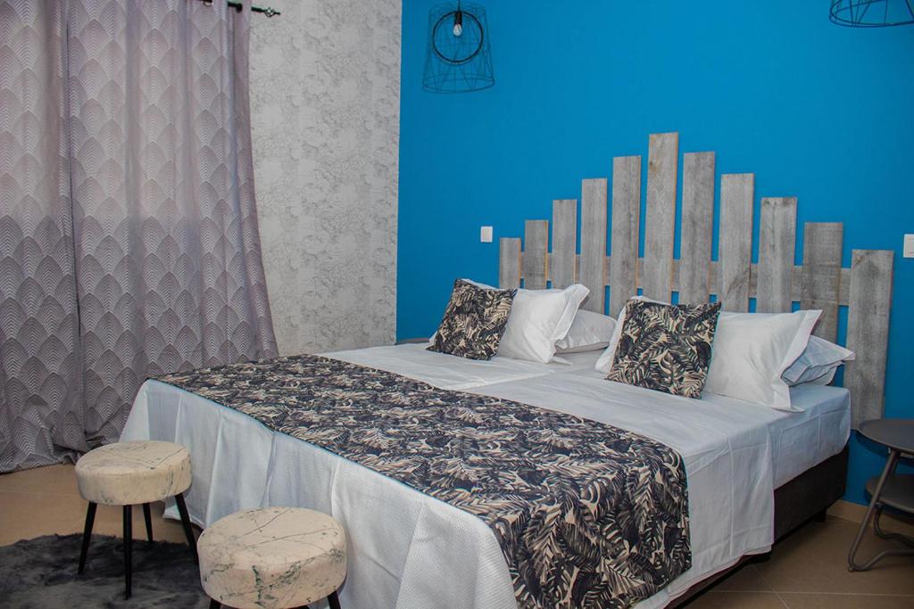 Postel nebo postele na pokoji v ubytování Aparthotel Palace