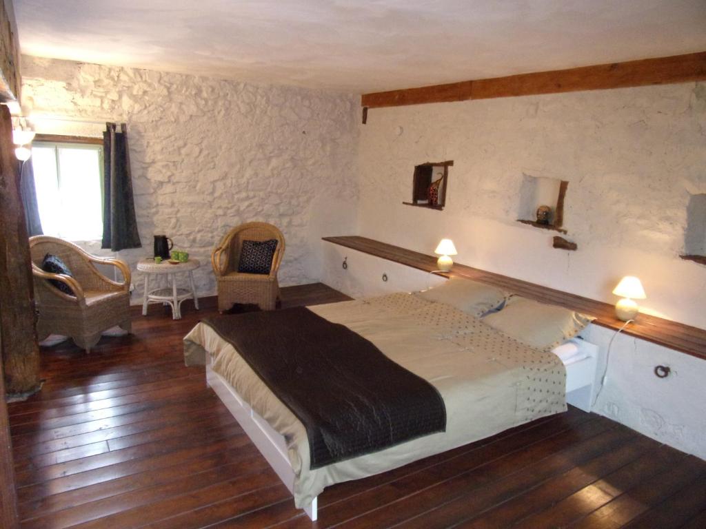 Katil atau katil-katil dalam bilik di Le Relais des El&eacute;phants Color&eacute;s