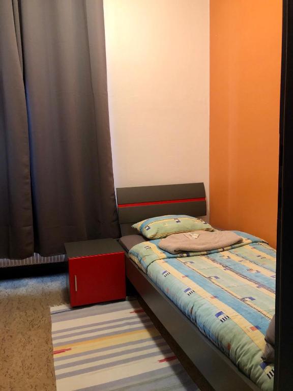 Letto o letti in una camera di Auberge Pour Tous