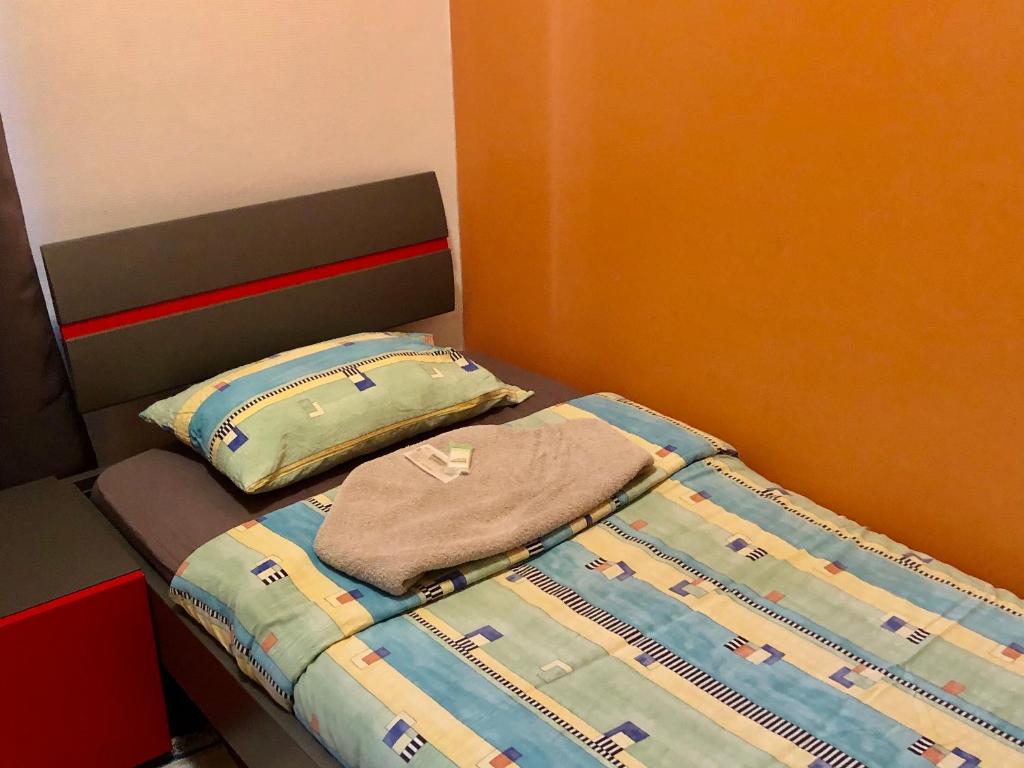 Letto o letti in una camera di Auberge Pour Tous