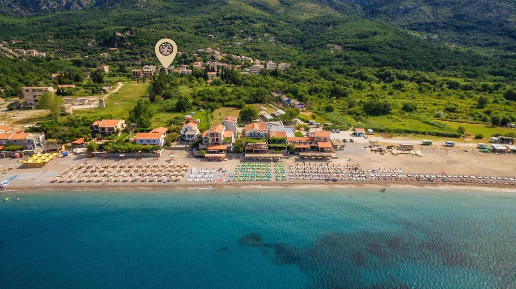 an aerial view of a resort on a beach at Apartments Viktorija in Petrovac na Moru
