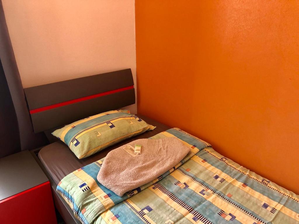 Letto o letti in una camera di Auberge Pour Tous