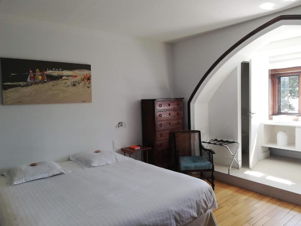 Postel nebo postele na pokoji v ubytování Manoir Dalmore