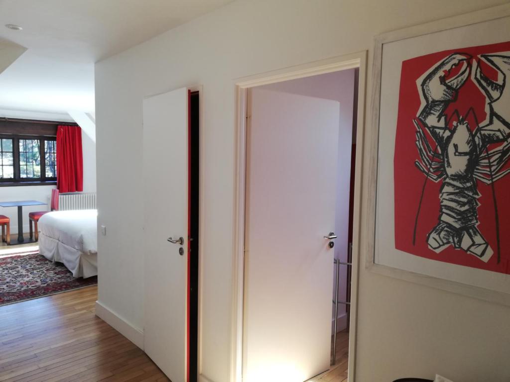 Postel nebo postele na pokoji v ubytování Manoir Dalmore