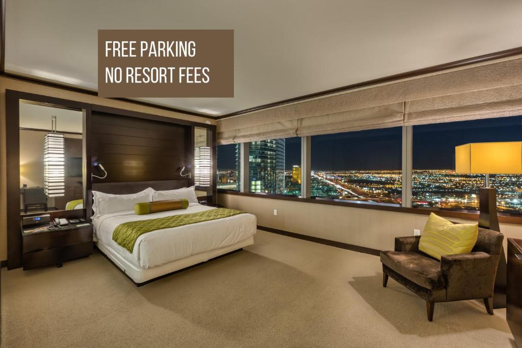 Ένα ή περισσότερα κρεβάτια σε δωμάτιο στο Secret Suites At Vdara