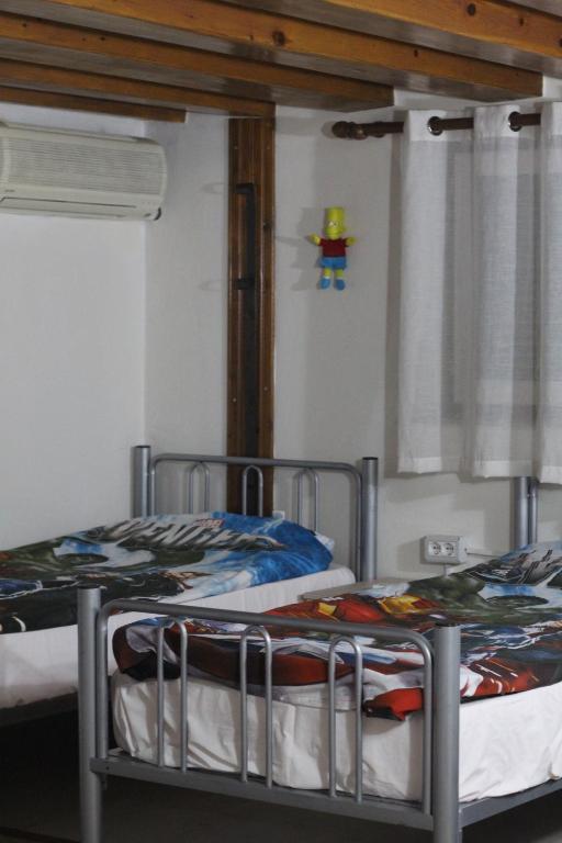 Letto o letti in una camera di Tufina Hostel
