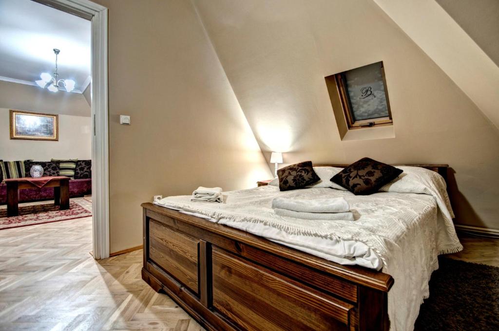 Posteľ alebo postele v izbe v ubytovaní Apartamenty Pod Baranami