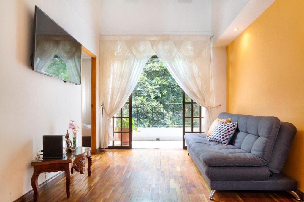 Posezení v ubytování Casa Entera-Cerca a Mall La Central y Estación de Tranvía