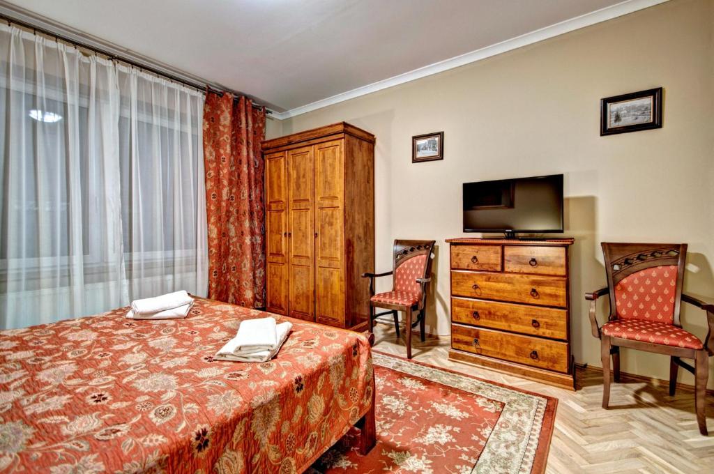 Posteľ alebo postele v izbe v ubytovaní Apartamenty Pod Baranami