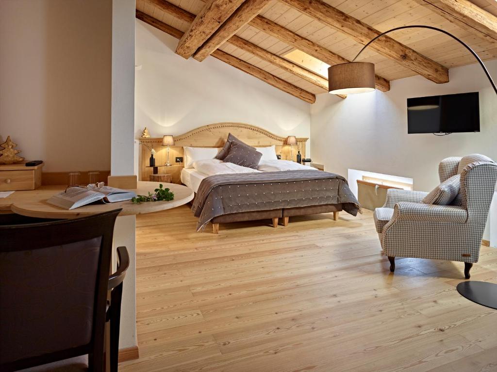 TV a/nebo společenská místnost v ubytování Romantic Hotel Excelsior