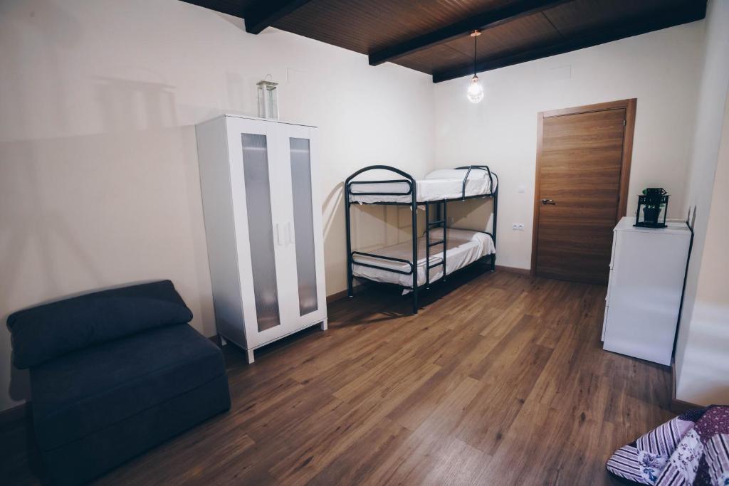 Postel nebo postele na pokoji v ubytování Complejo Roma
