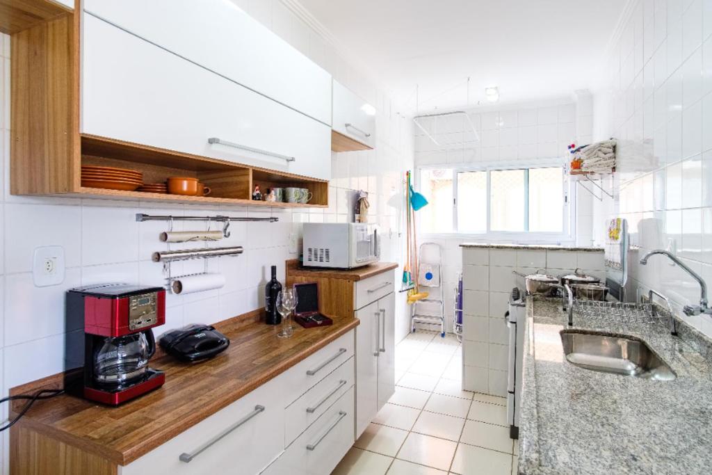  Apto 2 QTs c Garagem e Piscina no Centro