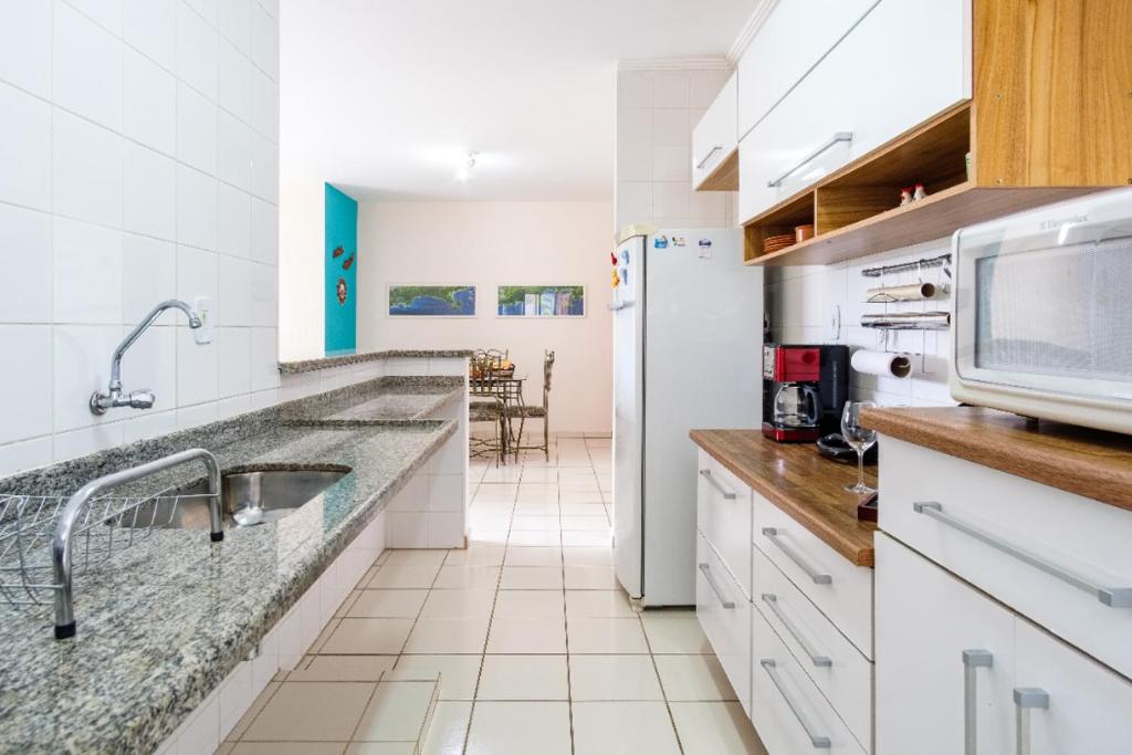  Apto 2 QTs c Garagem e Piscina no Centro