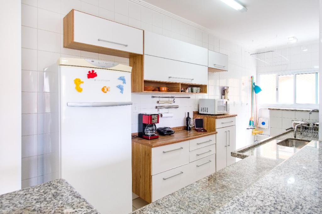  Apto 2 QTs c Garagem e Piscina no Centro