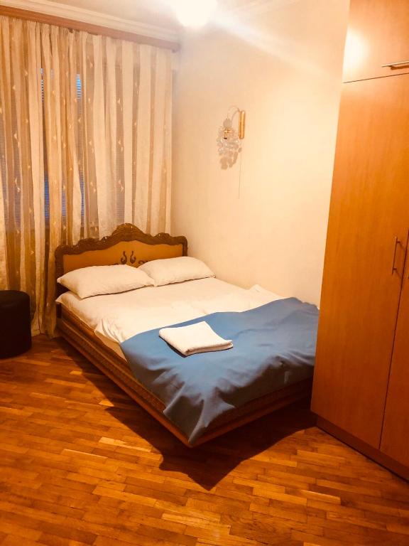 Postel nebo postele na pokoji v ubytování Center Hostel and Tours