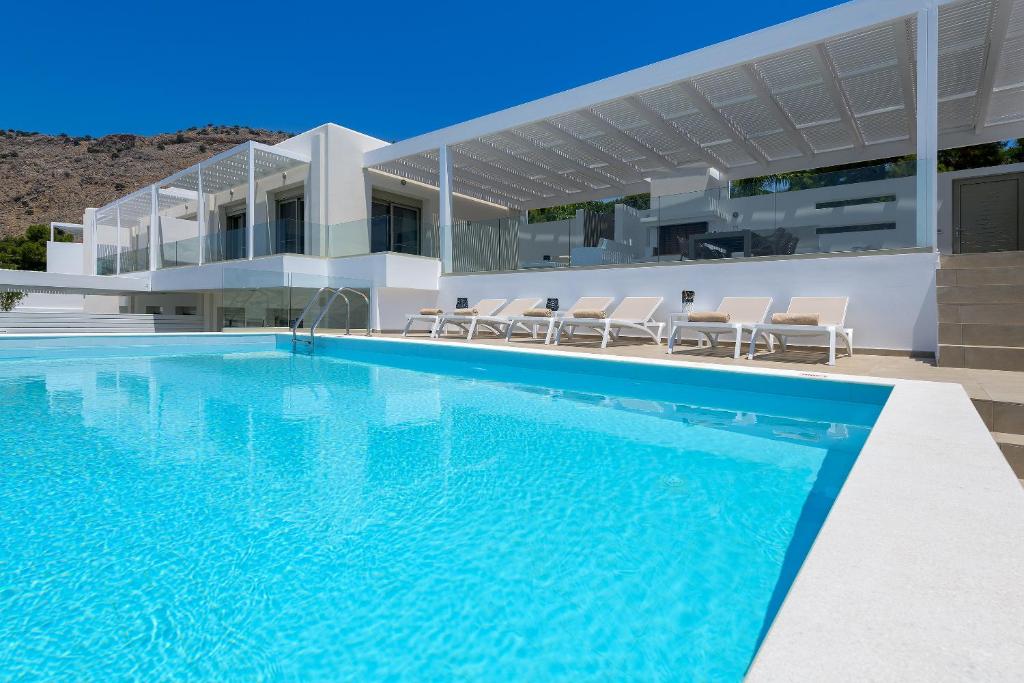 Bazén v ubytovaní Villa Dione in Pefkos, Lindos area alebo v jeho blízkosti