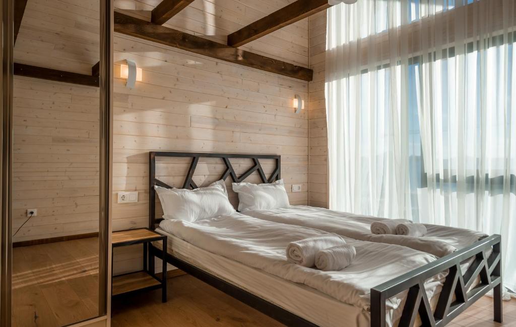 Postel nebo postele na pokoji v ubytování GVC 3-room 422 New Gudauri