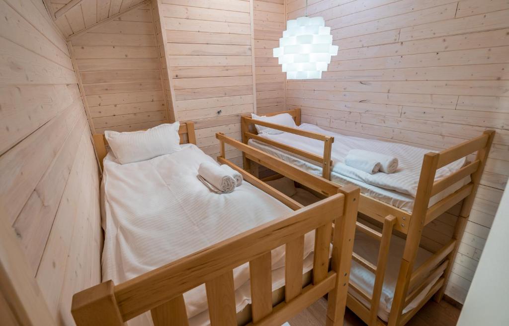 Postel nebo postele na pokoji v ubytování GVC 3-room 422 New Gudauri