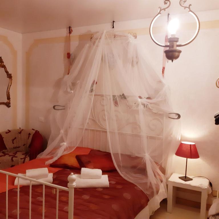 Łóżko lub łóżka w pokoju w obiekcie Valentina's Home
