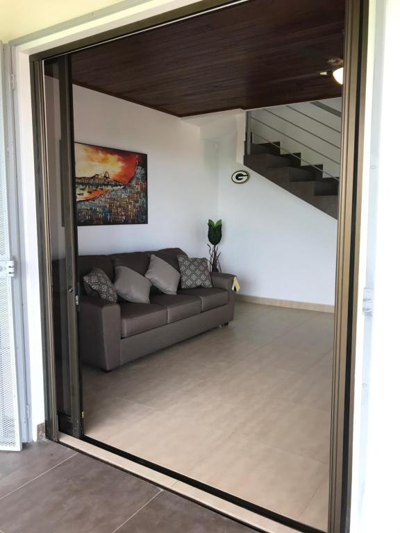 Posezení v ubytování Villas Lambeau 3 Ocean View - 2BR 3 BA