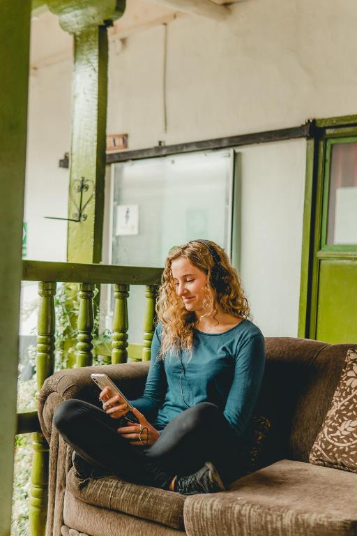 אזור ישיבה ב-Dragonfly Hostels Cusco
