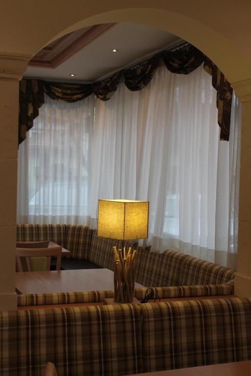 Postel nebo postele na pokoji v ubytování Hotel Canada