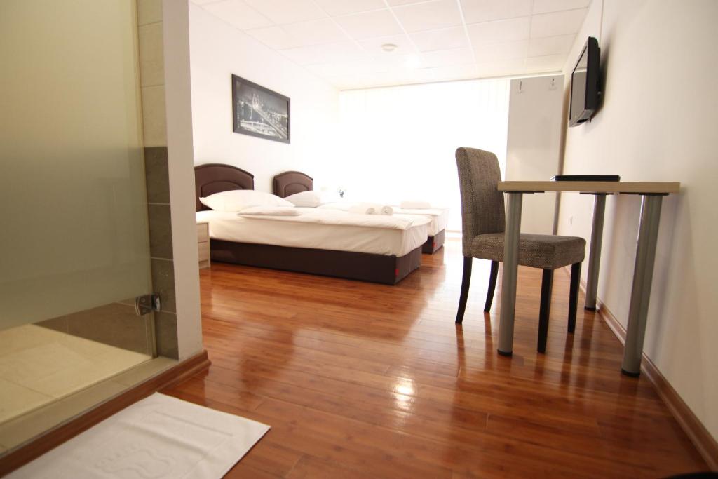 Posteľ alebo postele v izbe v ubytovaní Rooms XXL