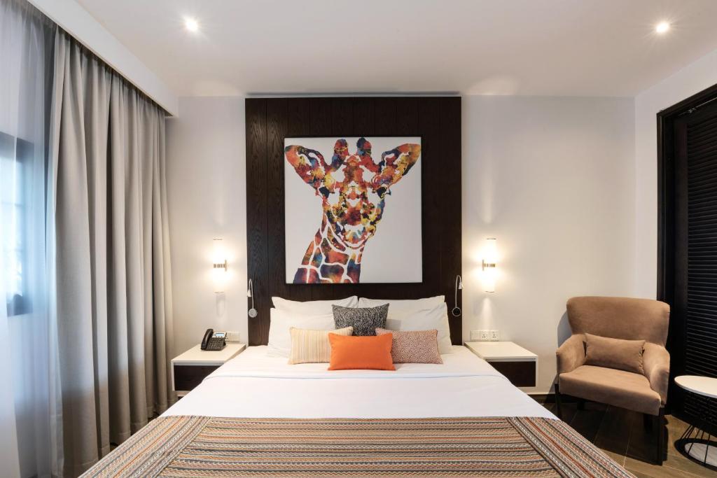 Una cama o camas en una habitación de Emirates Park Resort