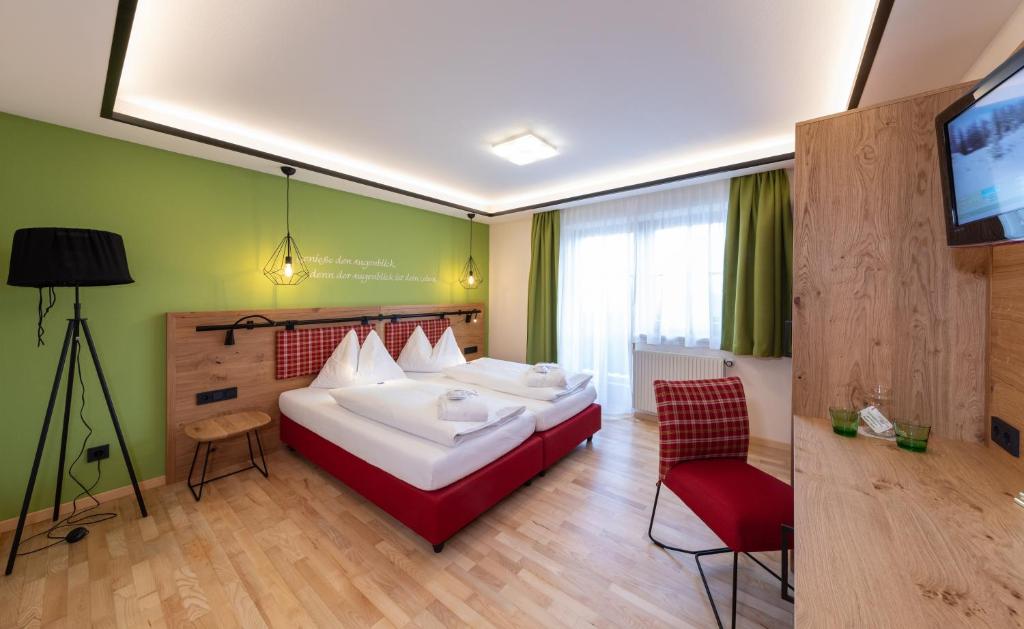Postel nebo postele na pokoji v ubytování Hotel Schröckerhof