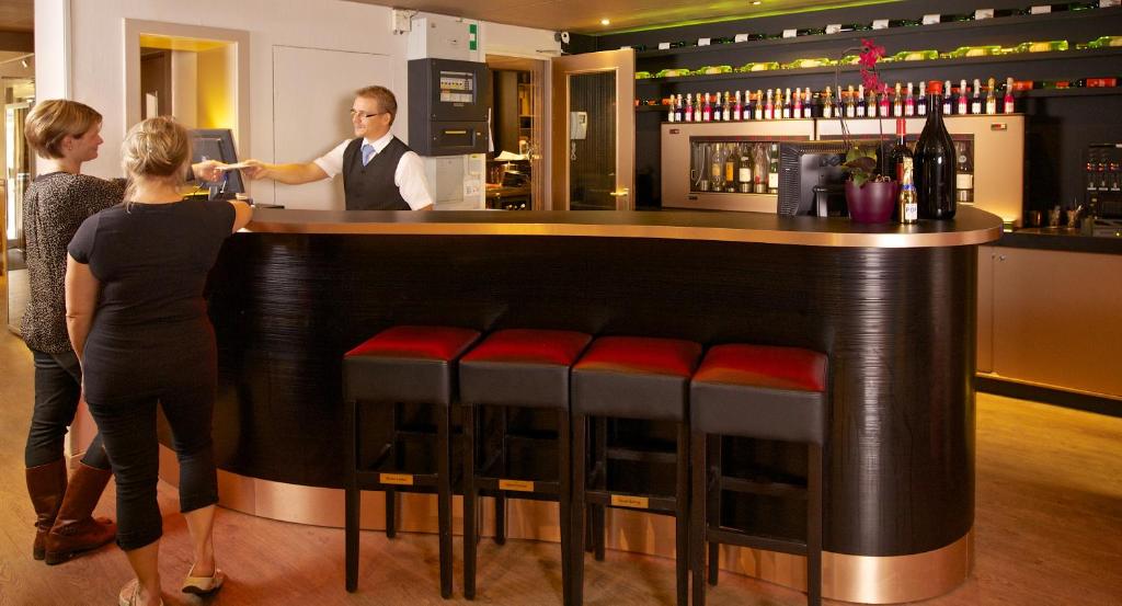 Lounge nebo bar v ubytování Hampshire Hotel Petit Nord