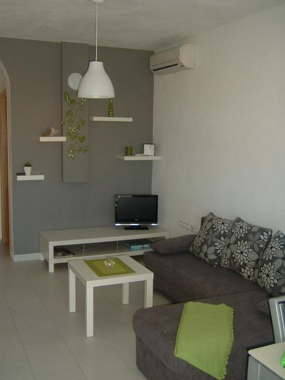 TV a/nebo společenská místnost v ubytování Apartmani Dragičević