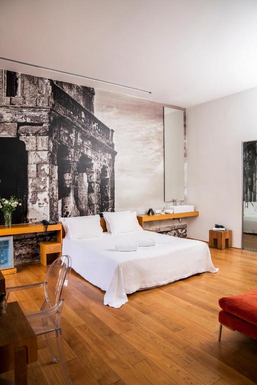 Posteľ alebo postele v izbe v ubytovaní Aire Hotel & Ancient Baths