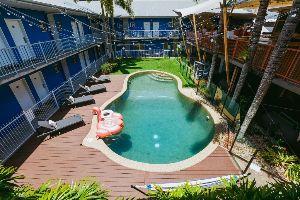 an overhead view of a swimming pool at a resort at Bounce Cairns in Cairns