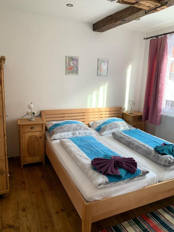 Postel nebo postele na pokoji v ubytování Tuxie Haus