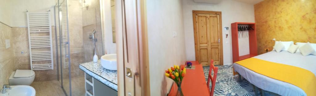 Postel nebo postele na pokoji v ubytování Casa Orrù