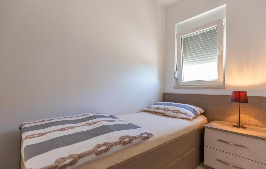 Postel nebo postele na pokoji v ubytování Anđela 4