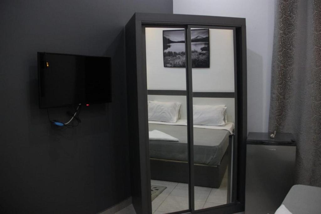Postel nebo postele na pokoji v ubytování Azar Boutique Hotel